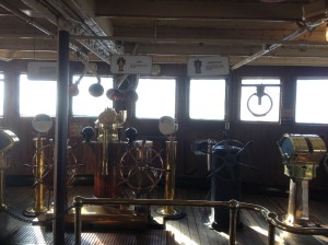 On the bridge. Who is at the helm?