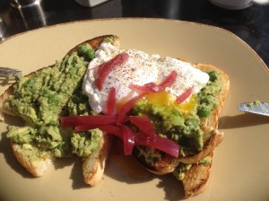 avocado, peas and mint on toast with poached eggs. A little bit eaten, sorry, the pic was an after-thought.